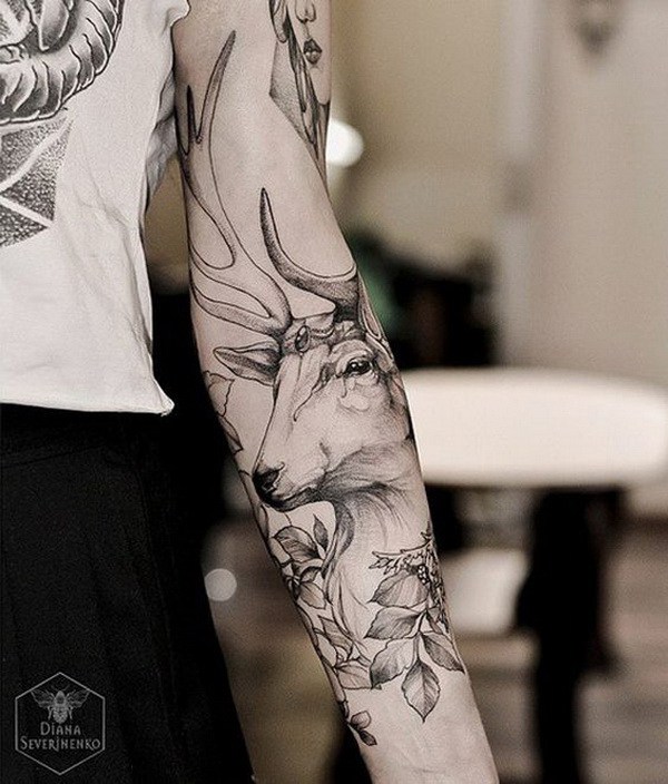 Deer Sleeve Tattoo.  www.  https://forcreativejuice.com/cool-sleeve-tattoo-designs/ 