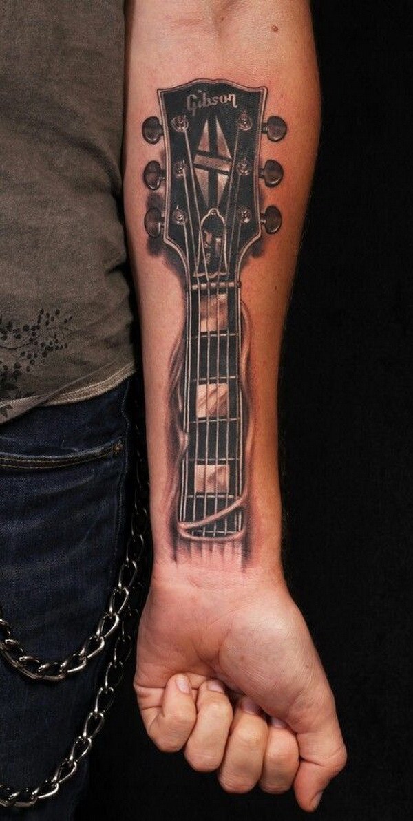 Diseño de tatuaje de guitarra en el antebrazo. ¡Qué idea genial de diseño de tatuaje!  Me encanta!  Este será mi próximo diseño de tatuaje.  a través de https://forcreativejuice.com/awesome-forearm-tattoo-designs/ 