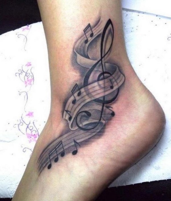 Tatuaje del pie de la música. 