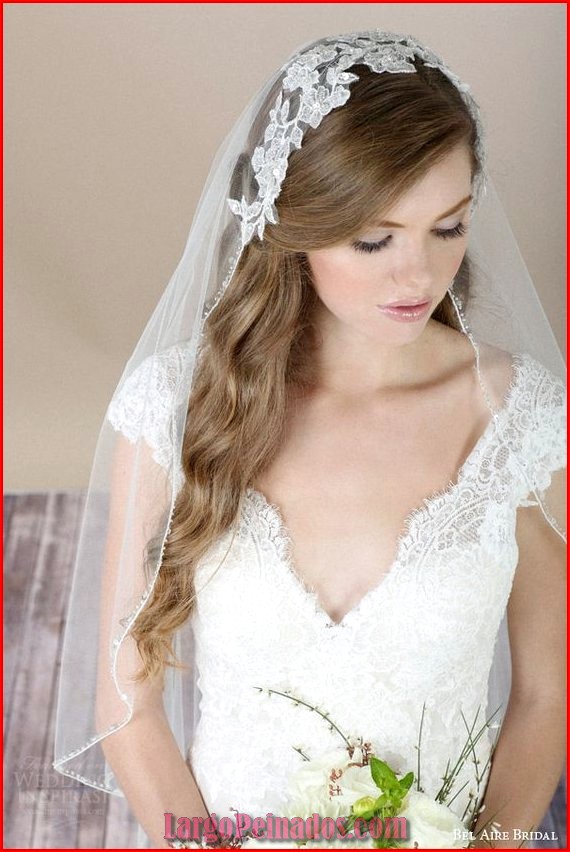 peinados de novia con velo y cabello largo 28